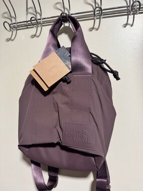 THE NORTH FACE W NEVER STOP MINI BACKPACK TAWNY QUARTZ Purple NEW